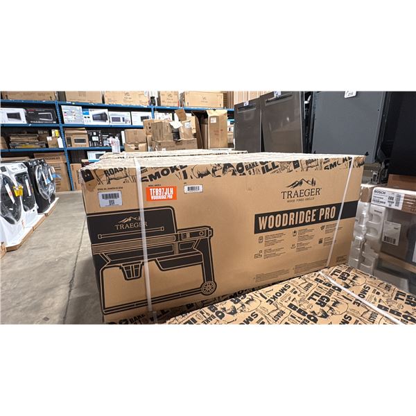 TRAEGER MODEL TFB97JLH. WOODBRIDGE PRO PELLET GRILL WITH SIDE SHELF AND CONNECTIVITY - 970-SQ.IN.