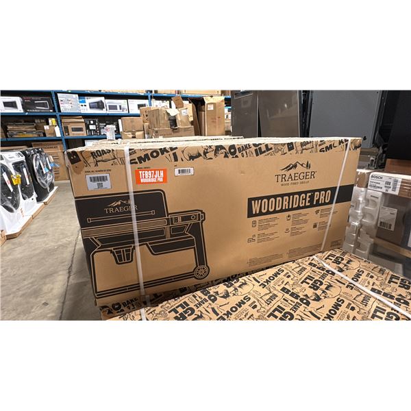 TRAEGER MODEL TFB97JLH. WOODBRIDGE PRO PELLET GRILL WITH SIDE SHELF AND CONNECTIVITY - 970-SQ.IN.