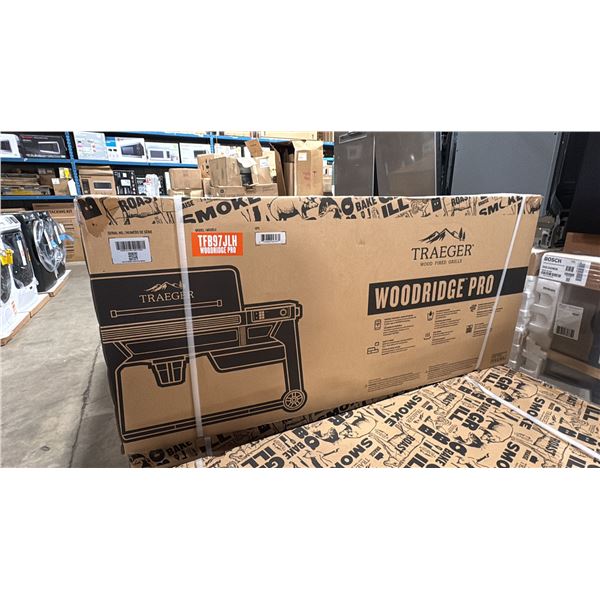 TRAEGER MODEL TFB97JLH. WOODBRIDGE PRO PELLET GRILL WITH SIDE SHELF AND CONNECTIVITY - 970-SQ.IN.