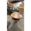 Image 2 : ASHLEY MODEL T683-0. AUSTANNY OVAL COCKTAIL TABLE. W52" D28" H17"
