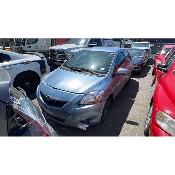 2009 TOYOTA YARIS, 4DRSD, BLUE, VIN JTDBT923X91310501,