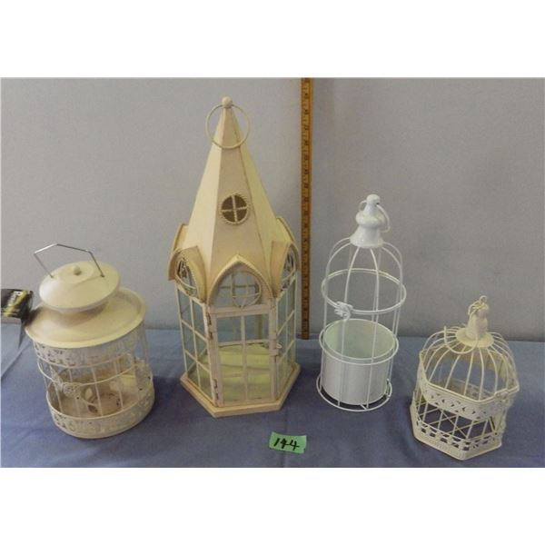 Lot of rustic style lanterns and bird cages possibly for candles