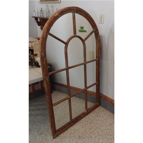 Arched mirror in the style of a window pane