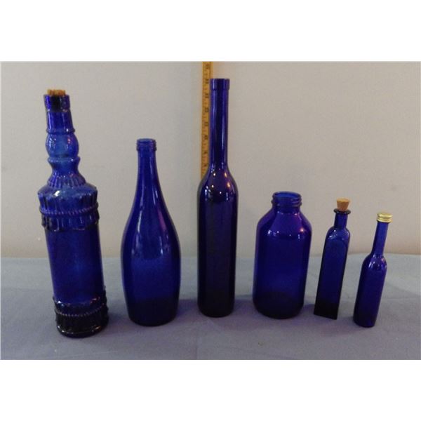 lot of blue decorative bottles