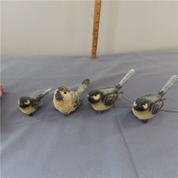 lot of small bird ornaments