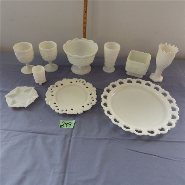 Collection of assorted milk glass items plates and goblets and vases etc
