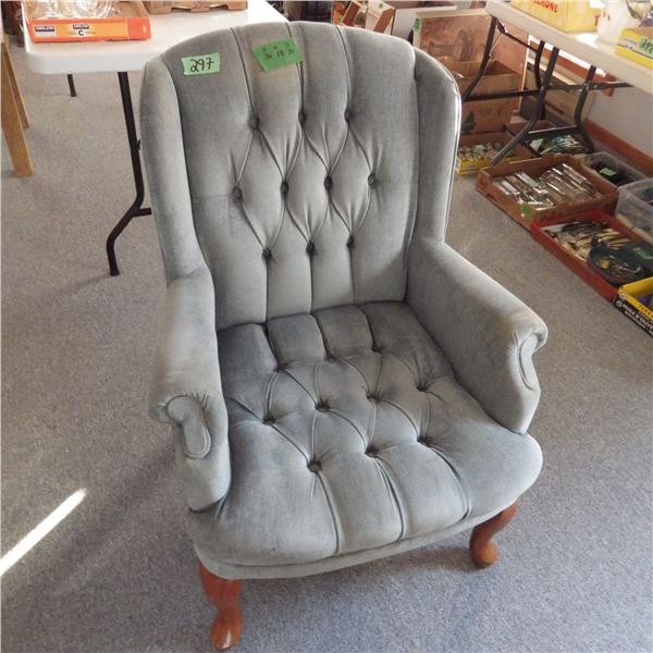 Button back armchair