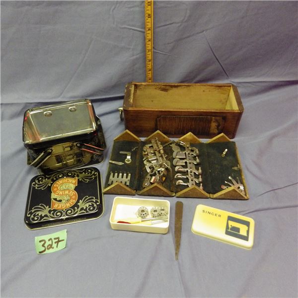 Singer sewing machine tin and attachments