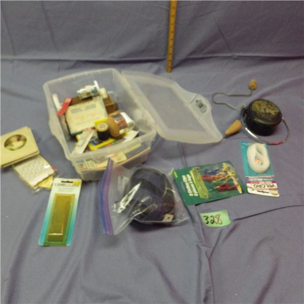 Container of thread and needles