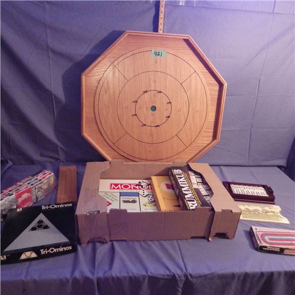 crokinole board, monopoly   and other board games