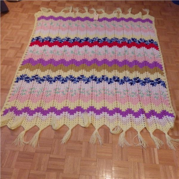 Hand crocheted knit blanket