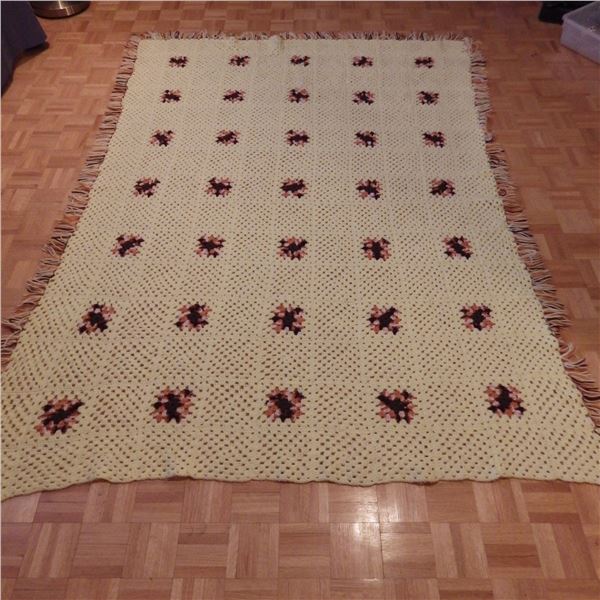 Hand crocheted knit blanket