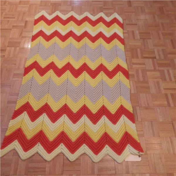 Hand crocheted knit blanket