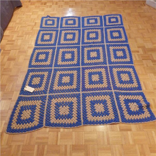 Hand crocheted knit blanket