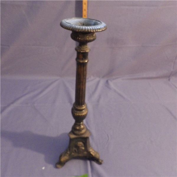 Larger candle holder looks to be cast metal