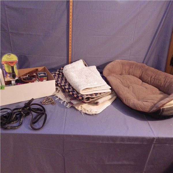 Lot of dog items , water dish, bed etc