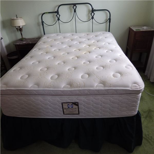 Antique wrought iron bed frame with Sealy Posturepedic mattress