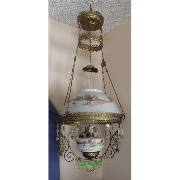 Antique hanging oil lamp with crystal prisms most likely hand painted on shade and oil body
