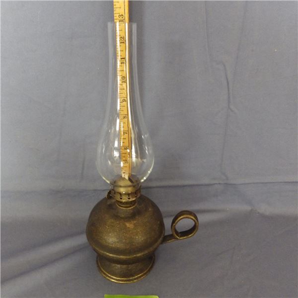 Vintage brass oil lamp with finger loop