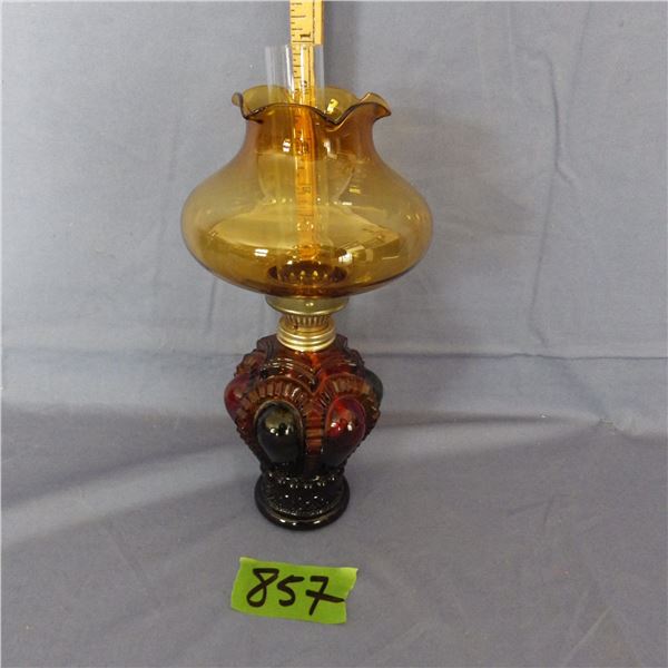 Reproduction glass oil lamp featuring a crown shaped design
