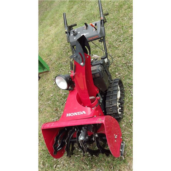Honda Hydrostatic walk behind tracked snowblower, electric start