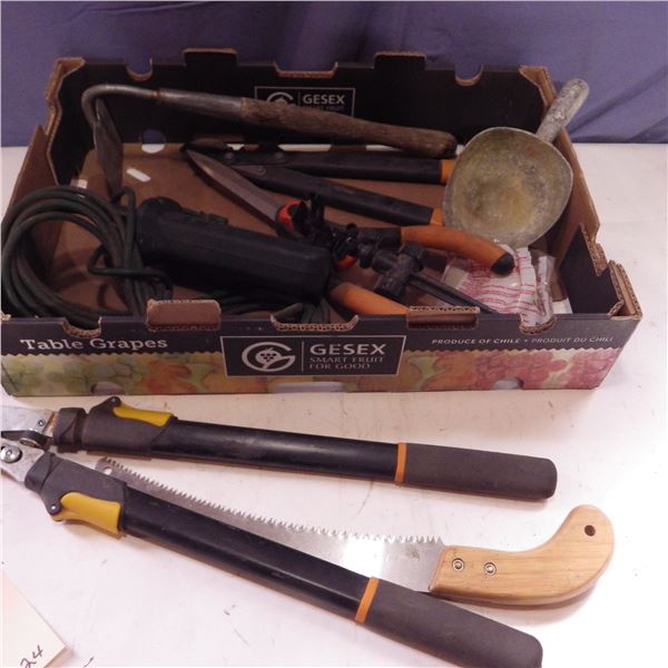 pruning shears , pruning saw and more gardening items