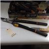 Image 2 : pruning shears , pruning saw and more gardening items