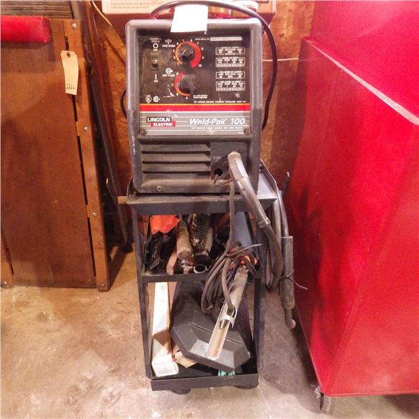 Lincoln electric Weld-Pak 100 Arc welding power source and wire feeder on rolling cart with cables