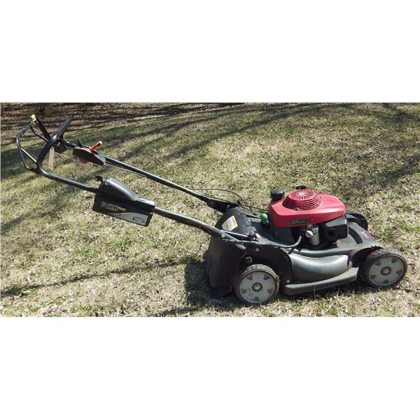 honda HRX 217 Electric start lawnmower with bag that has been repaired
