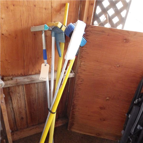 lot of cleaning mops etc