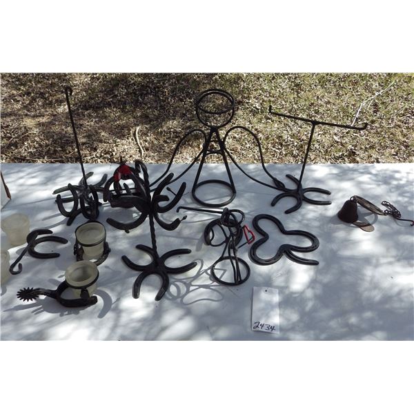 handcrafted iron items featuring horseshoes  etc