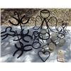 Image 1 : handcrafted iron items featuring horseshoes  etc