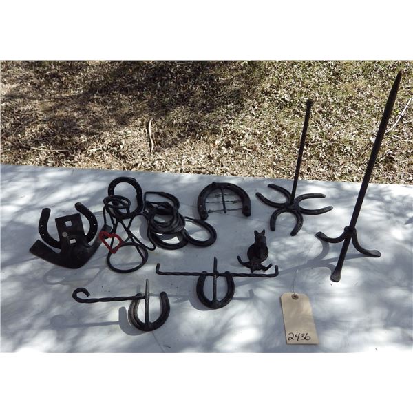handcrafted iron items featuring horseshoes  etc