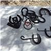 Image 2 : handcrafted iron items featuring horseshoes  etc