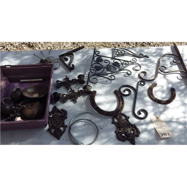 Iron shelf brackets , horseshoes , other iron items