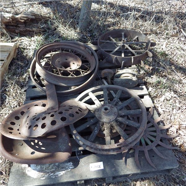 vintage steel implement seats and steel wheel rims etcetera