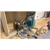 Image 1 : MAKITA MODEL LS1019L 10" SLIDING COMPOUND MITRE SAW WITH APPROX. 15FT WORK BENCH