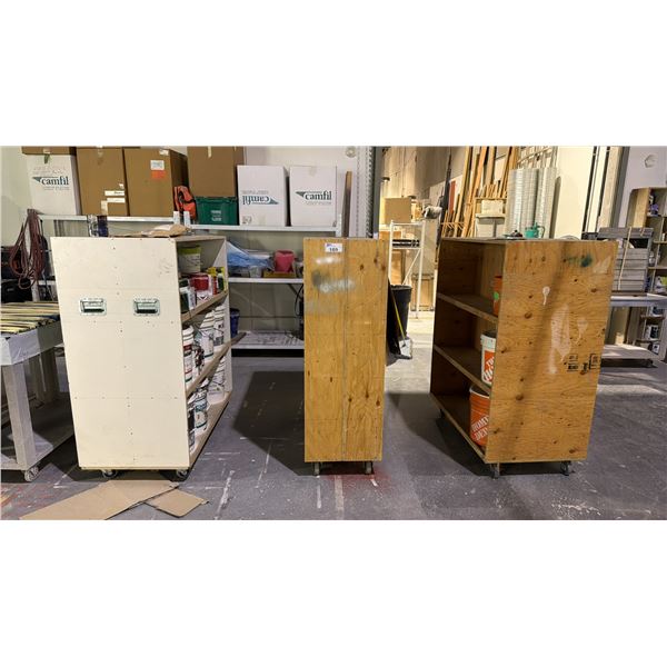 GROUP OF (3) DOUBLE SIDED MOBILE WOODEN  STORAGE SHELVES WITH CONTENTS - ASSORTED PAINT
