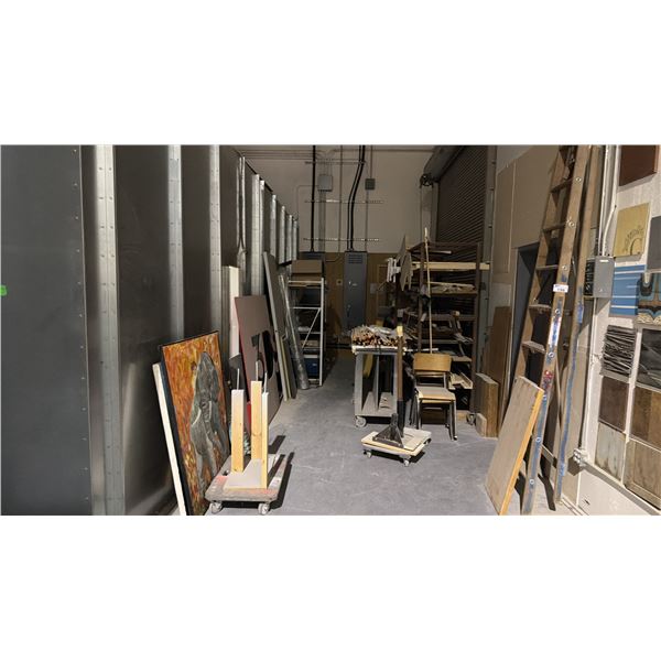 BACK CORNER OF ASSORTED METAL SHELVING UNITS, FLAT DOLLIES, MOBILE WORK CAT, WOODEN STEP