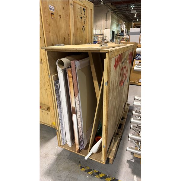 LARGE WOODEN STORAGE/TRANSPORT CRATE WITH ASSORTED OIL ON CANVAS ADVERTISING PRINTS