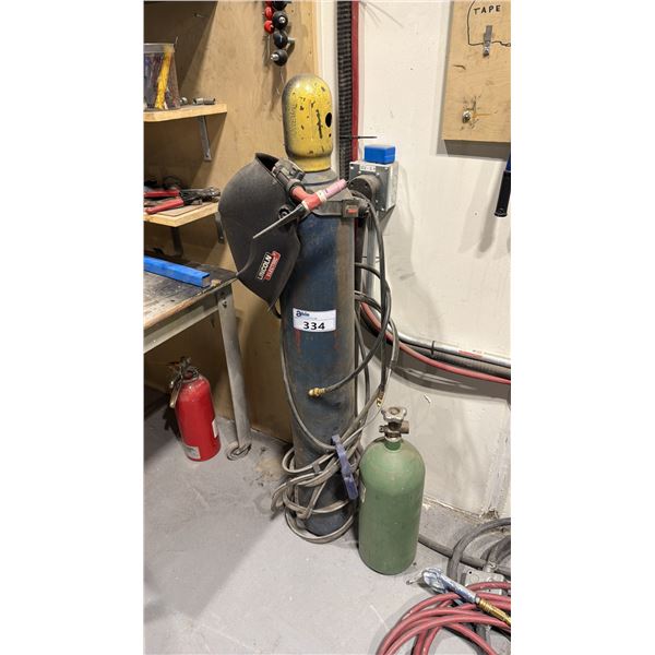 2 WELDING TANKS, TIG TORCH AND WELDING HELMET