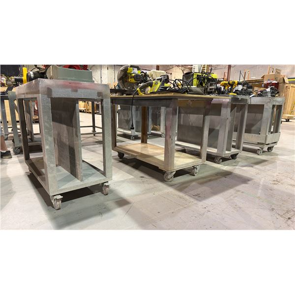 GROUP OF (4) MOBILE WOODEN WORK TABLES