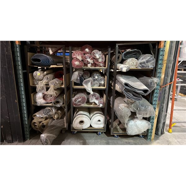 3 METAL STORAGE SHELVES FULL OF ASSORTED AREA RUGS
