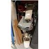 Image 9 : 3 METAL STORAGE SHELVES FULL OF ASSORTED AREA RUGS