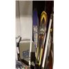 Image 2 : BARREL OF DOWN HILL SKI'S/SNOWBOARD AND WHITE METAL RACK