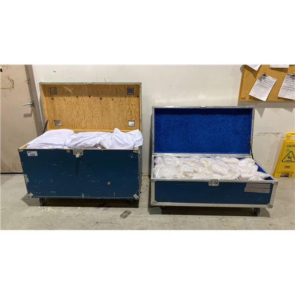 2 MOBILE TRANSPORT BOXES OF WHITE TABLE CLOTHS AND TASSELS