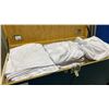 Image 2 : 2 MOBILE TRANSPORT BOXES OF WHITE TABLE CLOTHS AND TASSELS