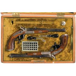 Exhibition Grade Cased Pair of Gold Inlaid, Relief Engraved German Breach Loading Target Pistols -A)