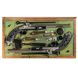 Exhibition Set of Relief Engraved "Gastinne Renette" French Dueling Pistols with Gold Inlay Ebony St