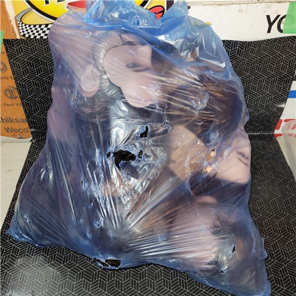 Garbage Bag of Mannequin Heads